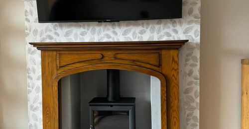 Widescreen Cedar Log Burner Installed In Nottingham