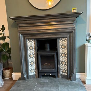 Multi fuel log burner on a tiled hearth with original fire surround fitted in old dalby : Click Here To View Larger Image